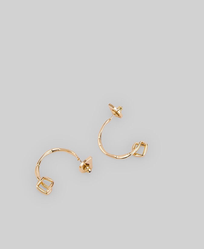 Adolfo dominguez Aros dorados nudo en extremo mujer