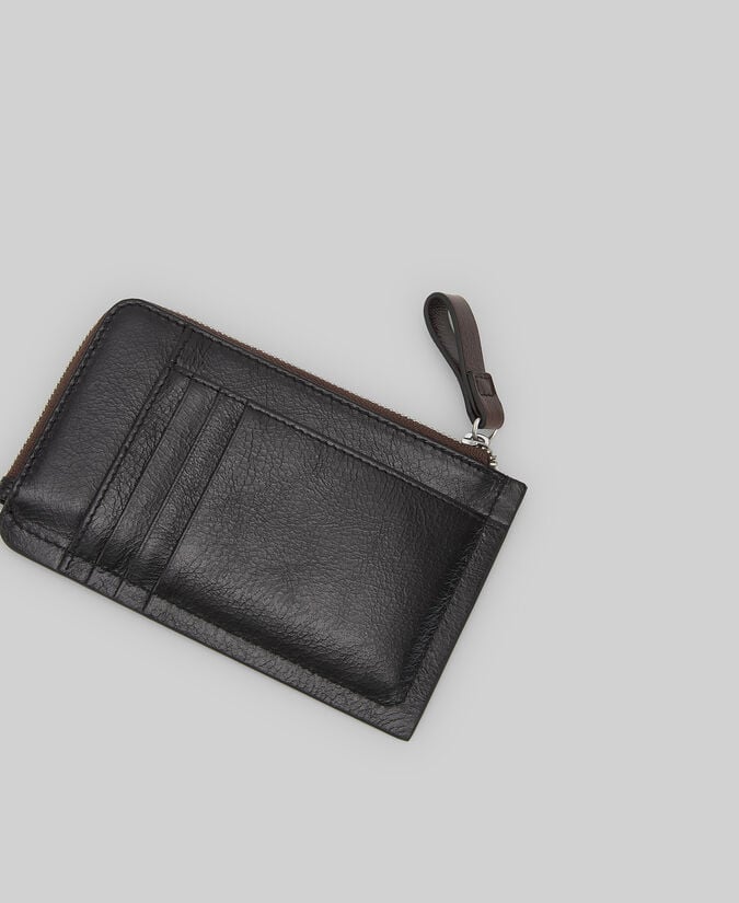 Adolfo dominguez Monedero piel responsable brillo mujer