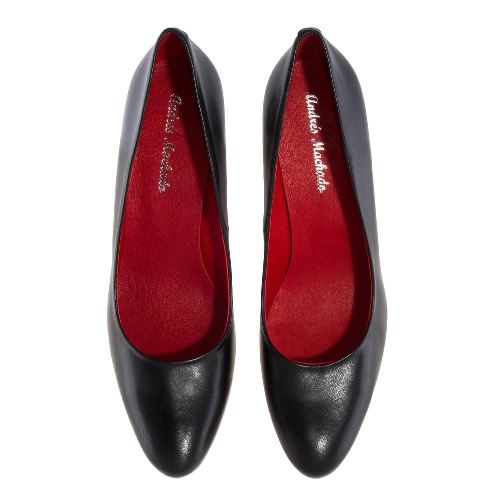 Andres Machado Salón Piel Negro