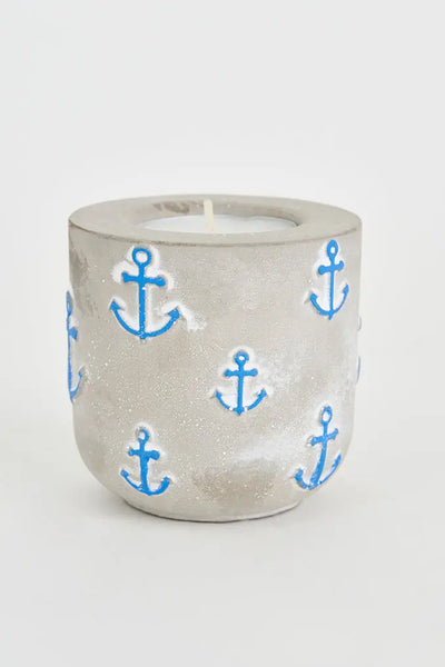 Batela Portavelas de cemento con anclas azules: estilo náutico