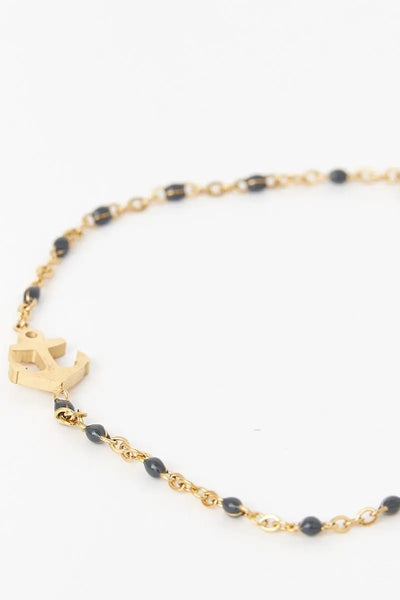 Batela Pulsera o brazalete color dorado con ancla piedra azul. - Batela