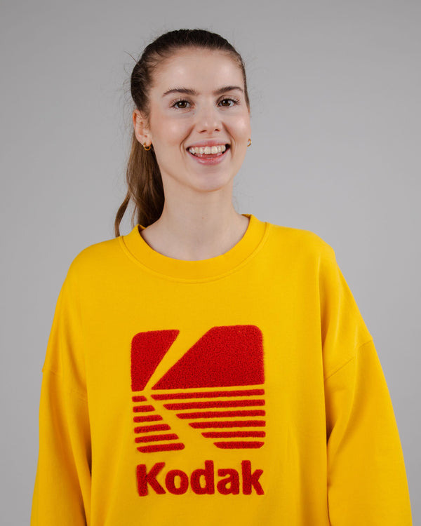 Brava fabrics Sudadera Bajo Redondeado Algodón Kodak Logo Amarilla