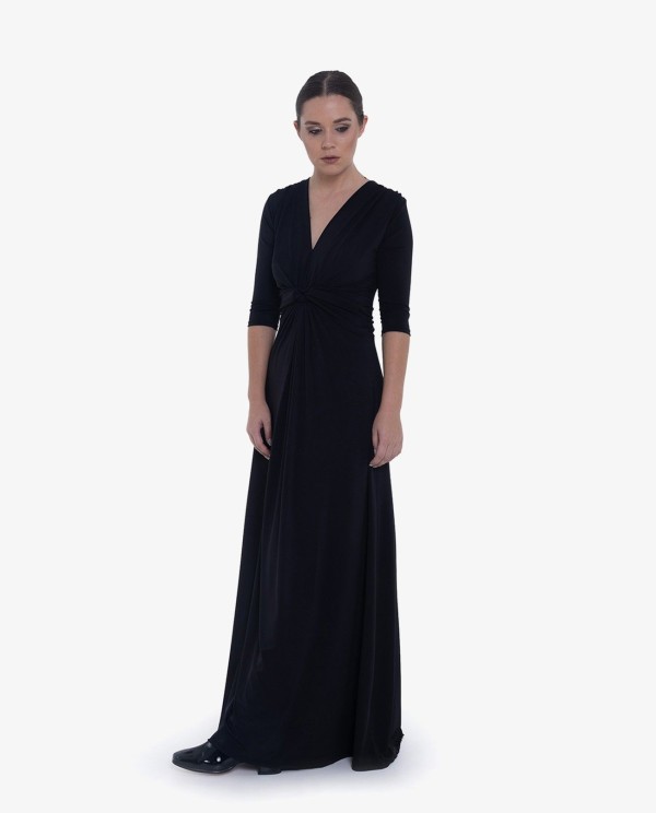 Cuplé MAXI VESTIDO NEGRODE PUNTO CON NUDO FRONTAL Y MANGAS TRES CUARTOS