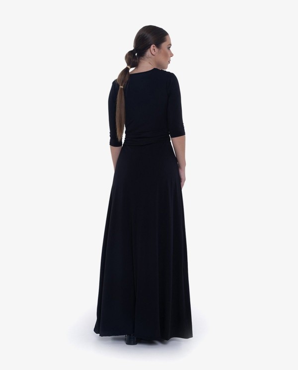 Cuplé MAXI VESTIDO NEGRODE PUNTO CON NUDO FRONTAL Y MANGAS TRES CUARTOS