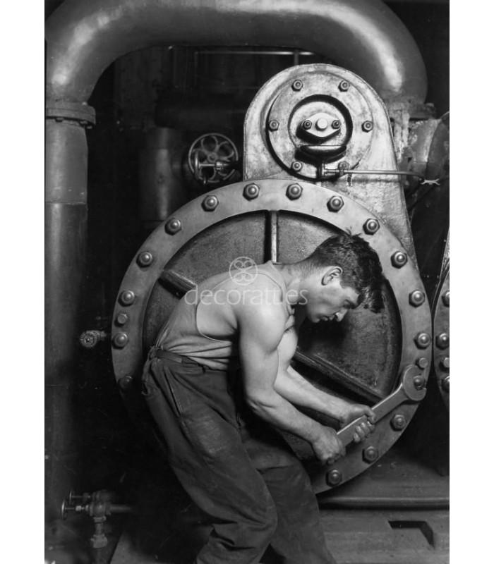 Decoratt Power house mechanic working on steam pump Lewis Hine