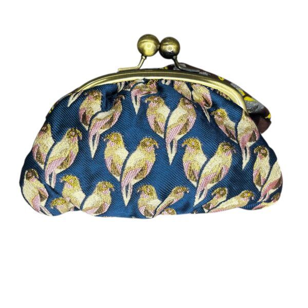 El Caballo Monedero Loros