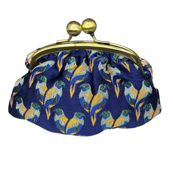 El Caballo Monedero Loros