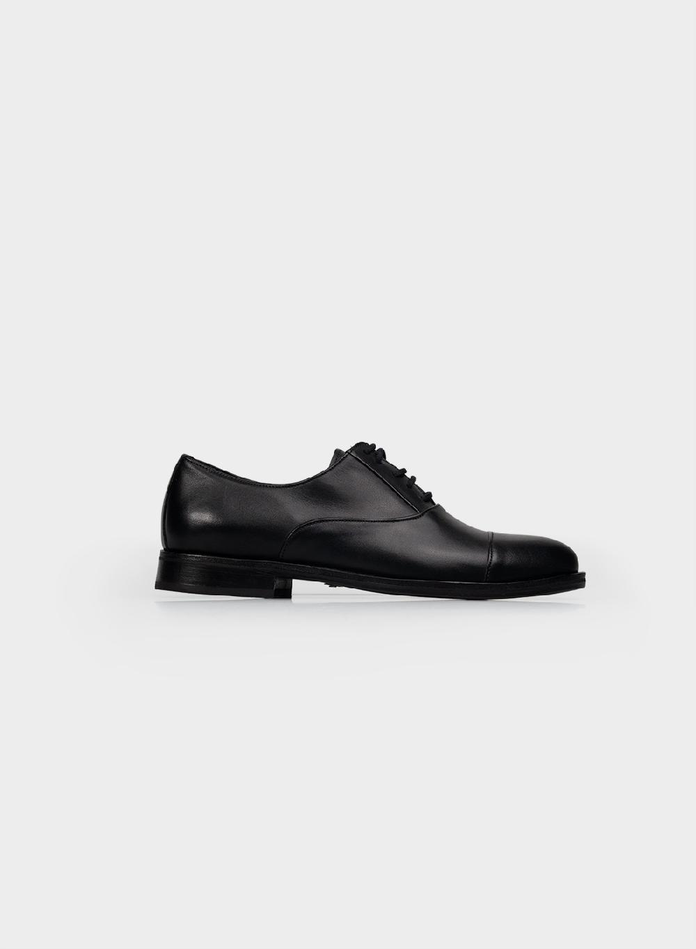 Etiqueta negra Zapato Abotinado