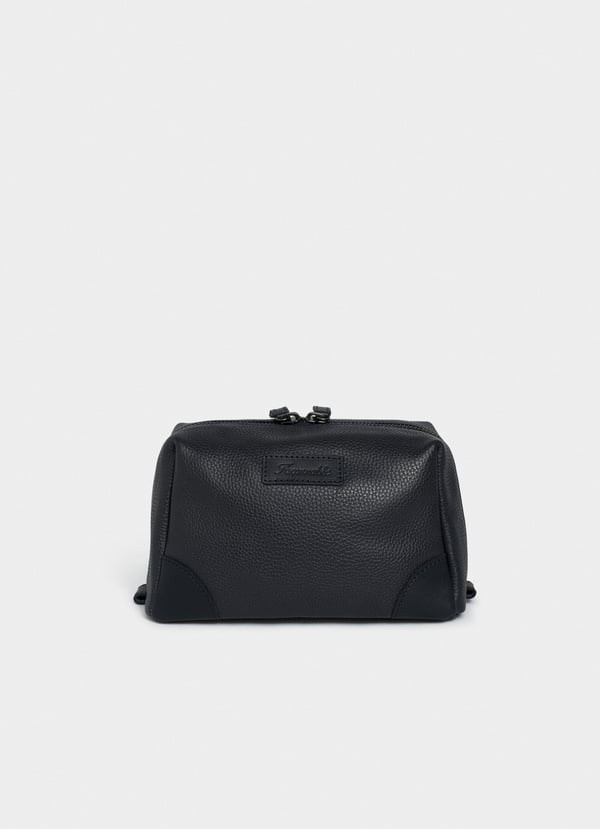 Façonnable neceser de piel