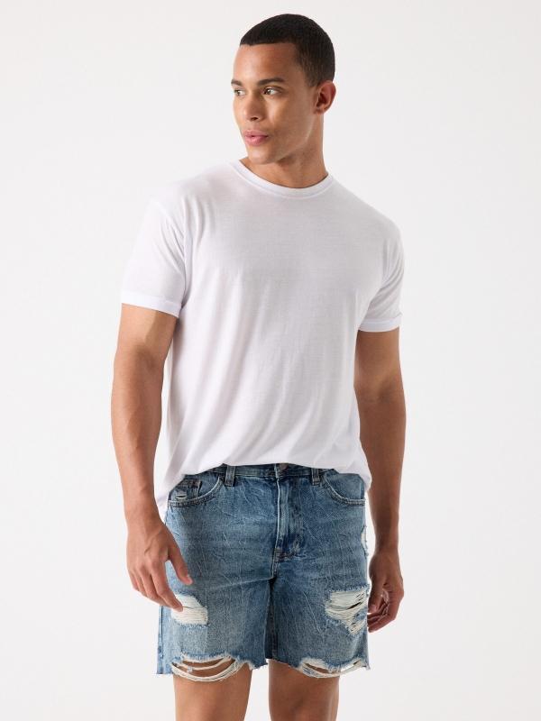 In side Bermuda denim desgastada rotos