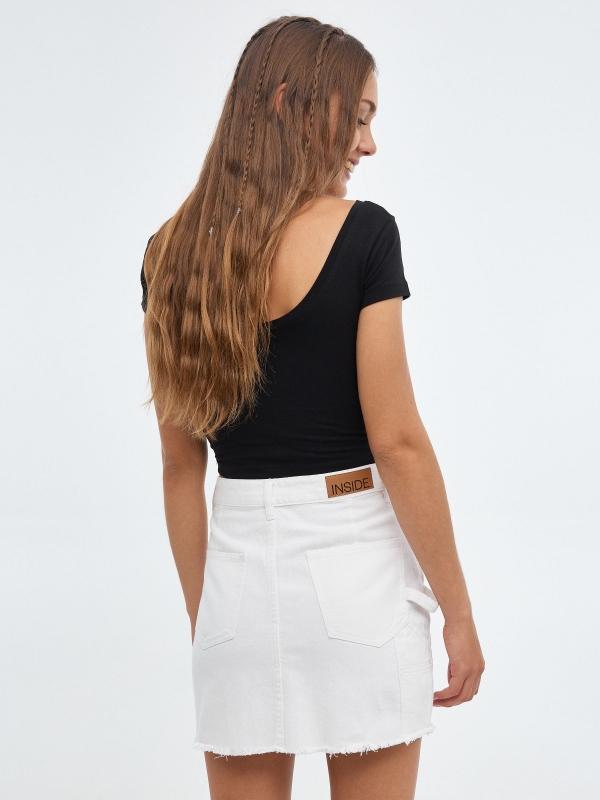 In side Falda denim con bajo deflecado