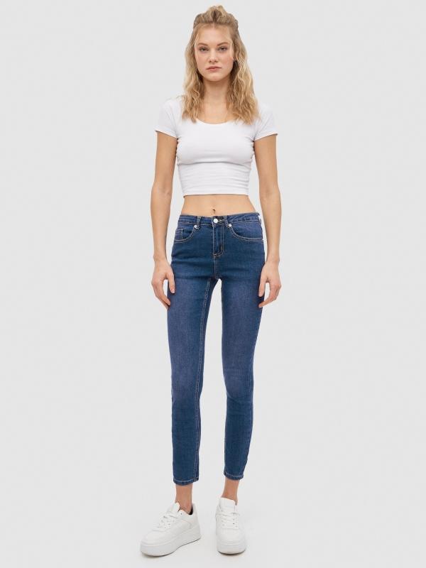 In side Jeans skinny con rotos mid rise