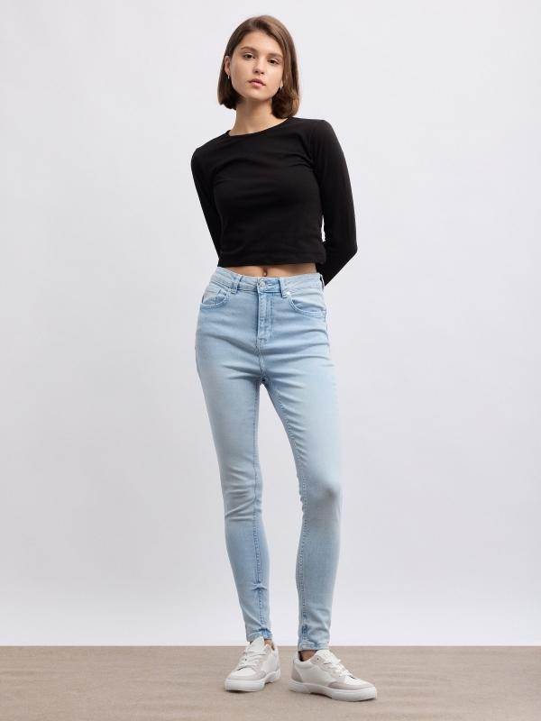 In side Jeans skinny denim tiro alto