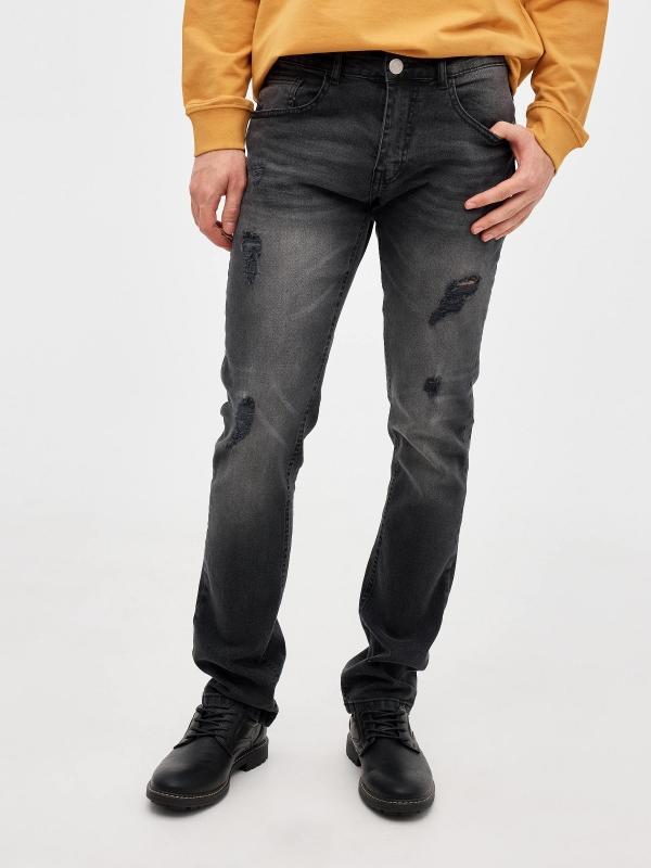 In Side Jeans Slim Con Rotos Negros