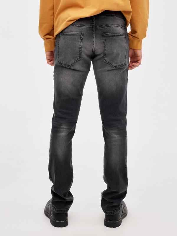 In Side Jeans Slim Con Rotos Negros