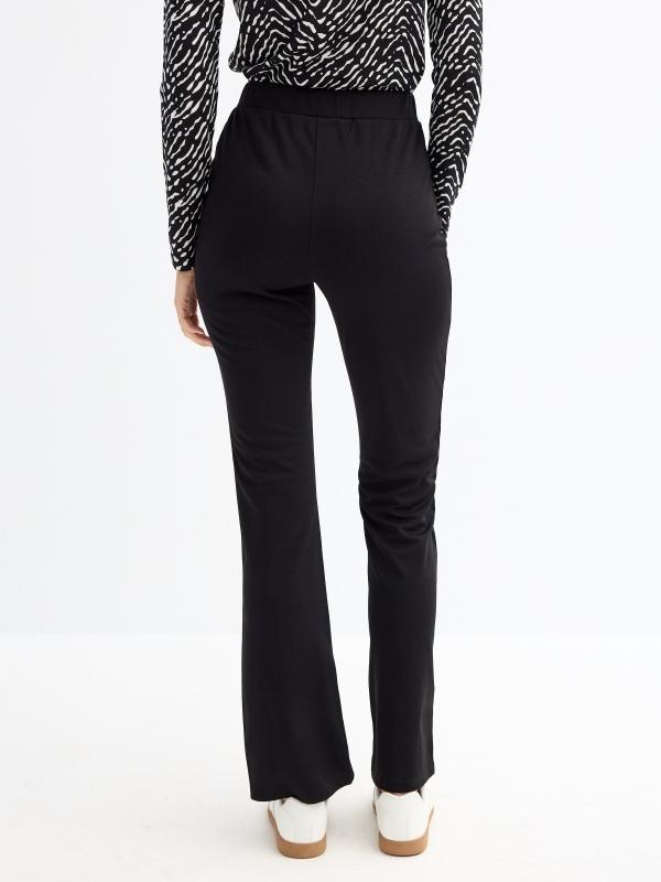 In Side Leggings Flare Bajo Abertura