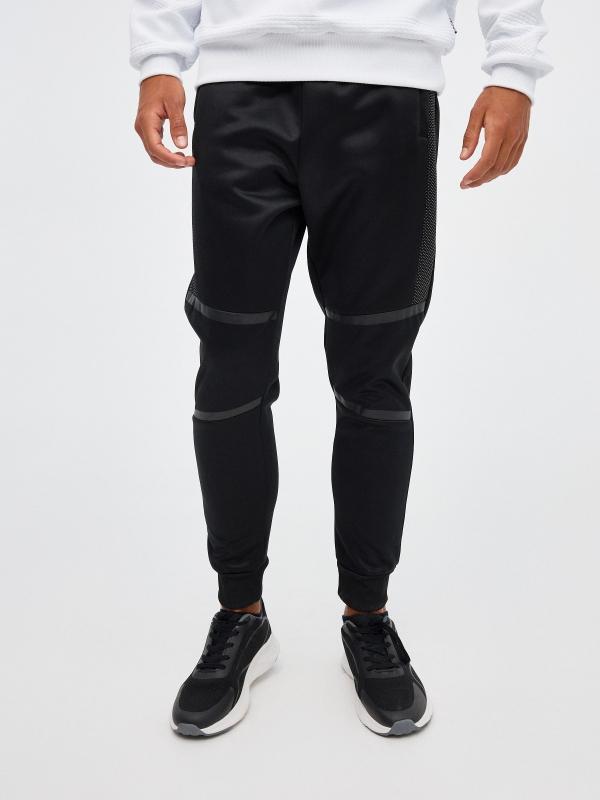 In Side Pantalón Jogger Negro