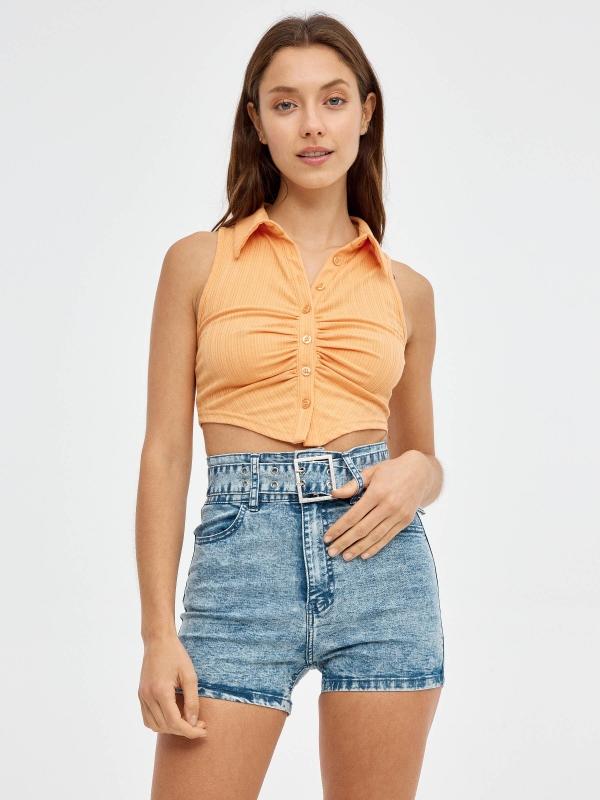 In side Shorts denim con cinturón