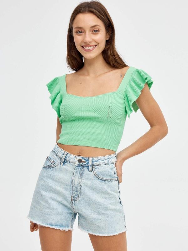 In side Shorts denim desilachados