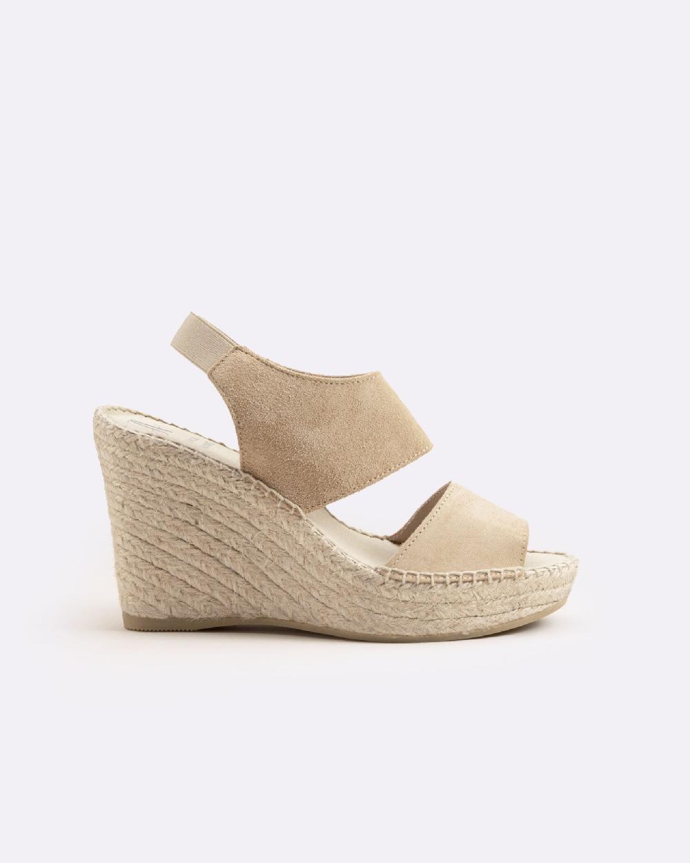 juncal aguirre Cuñas Iris Avellana