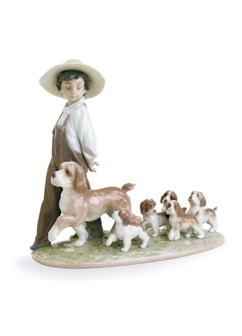 lladro Figura niño con perros Mis pequeños exploradores