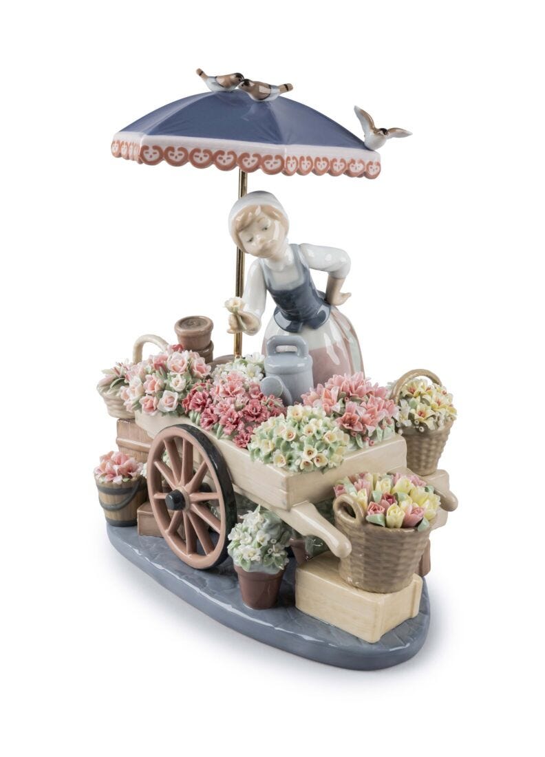 lladro Escultura mujer El puesto de flores