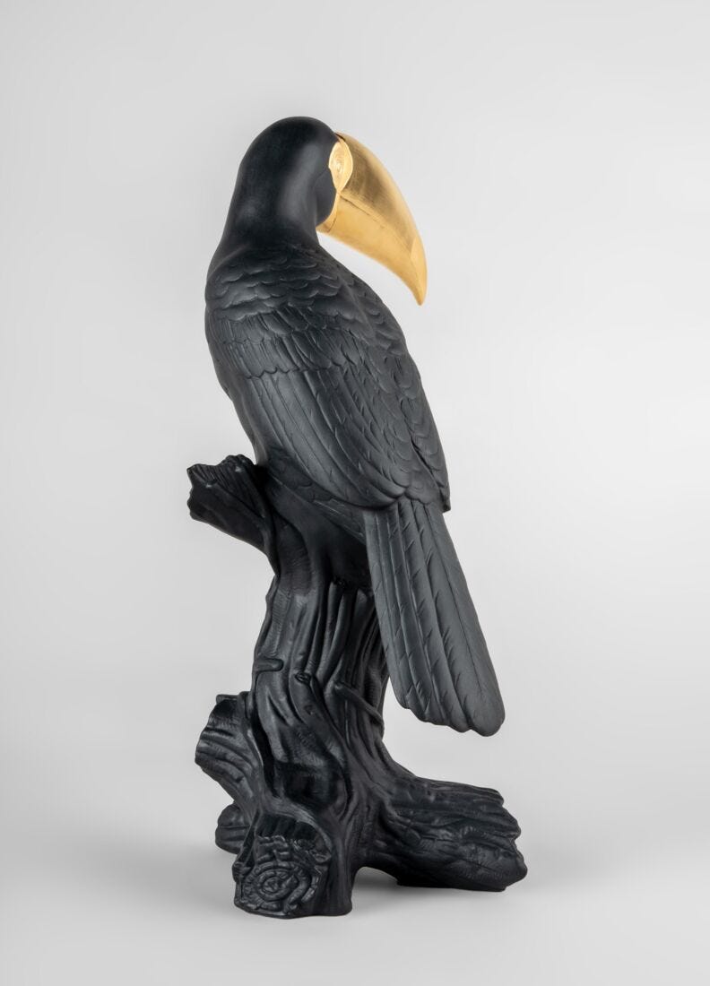 Lladro Escultura Tucán. Negro-dorado. Serie Limitada