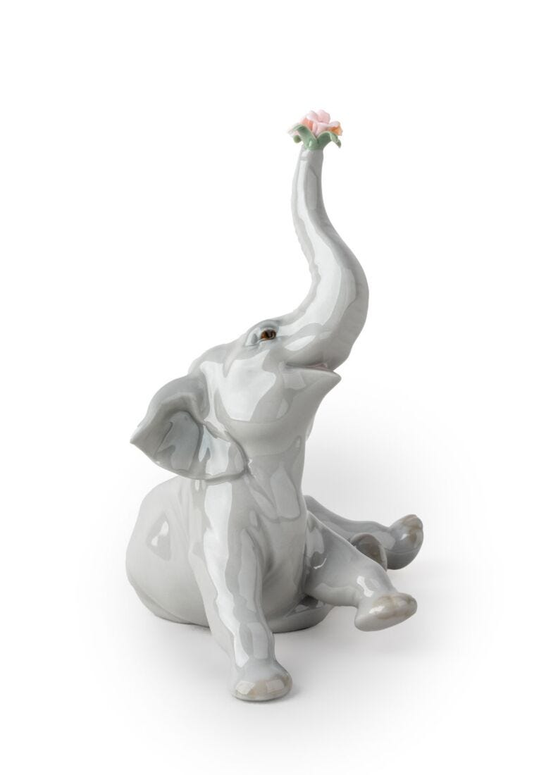 lladro Figura Elefante bebé con flor rosa