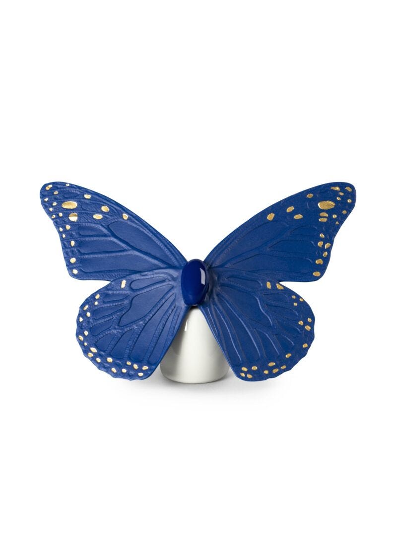 lladro Figura Mariposa. Lustre oro y azul