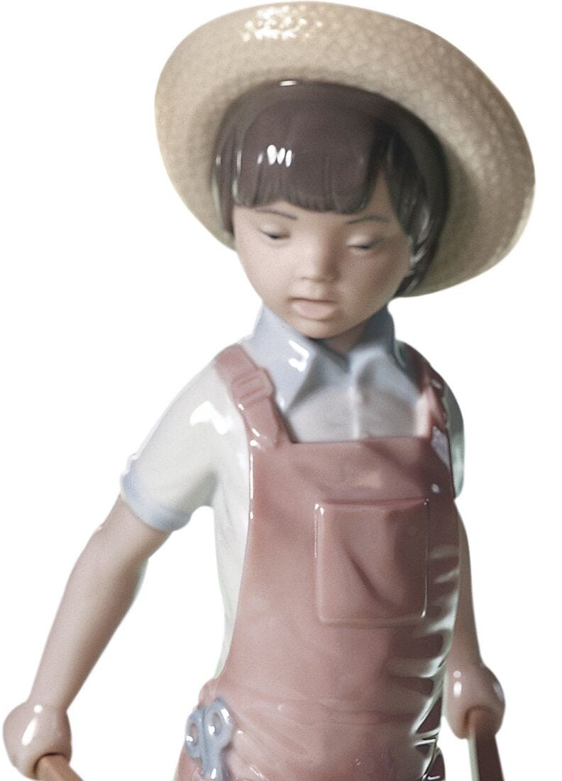 lladro Figura niño Carretilla con flores