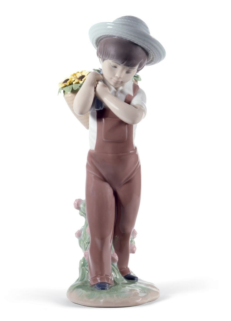 lladro Figura niño Flores a la espalda
