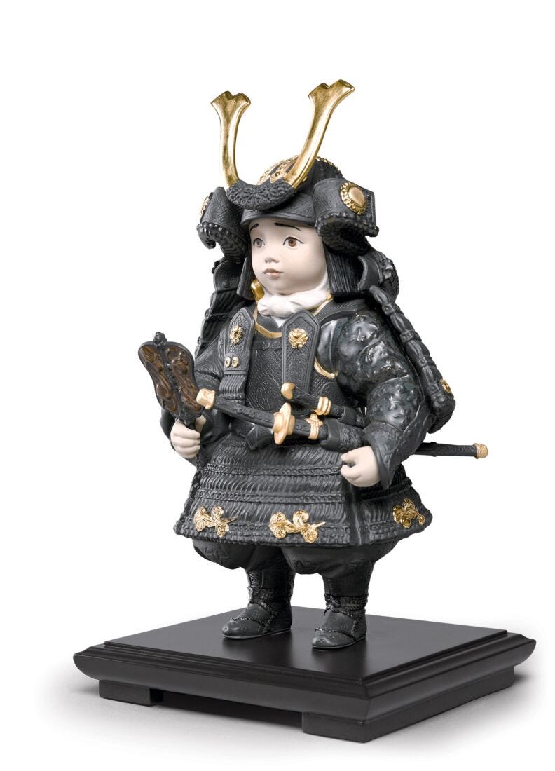 Lladro Figura Niño Samurái. Lustre Oro