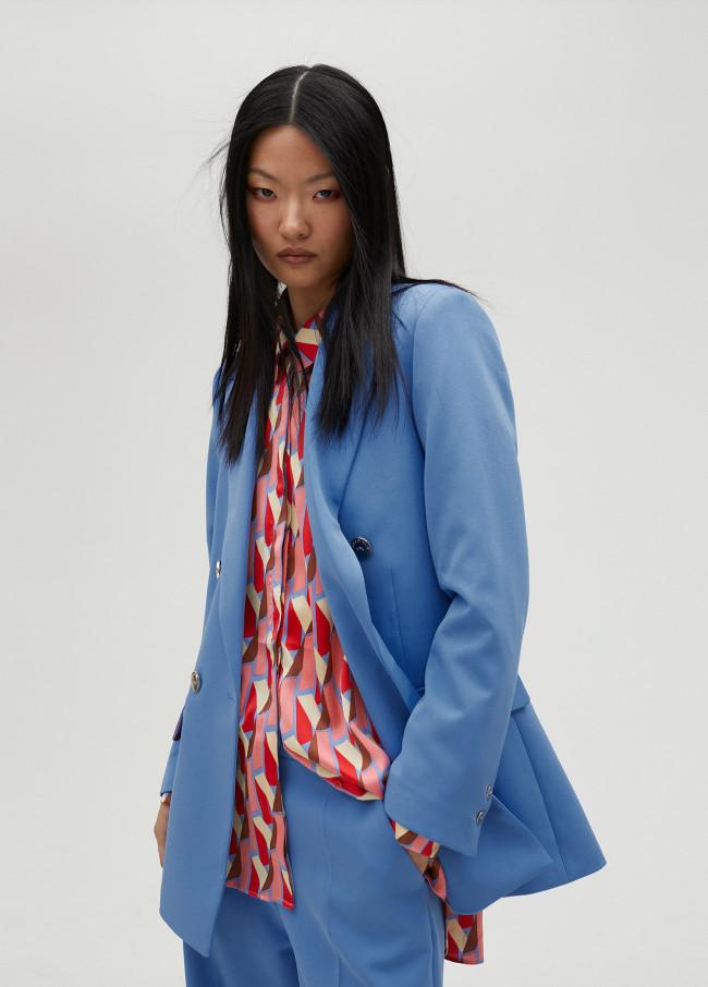 lola casademunt American cruzada azul