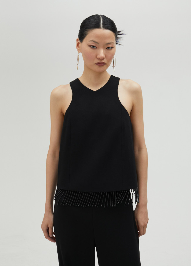 lola casademunt Top con flecos y pedrería