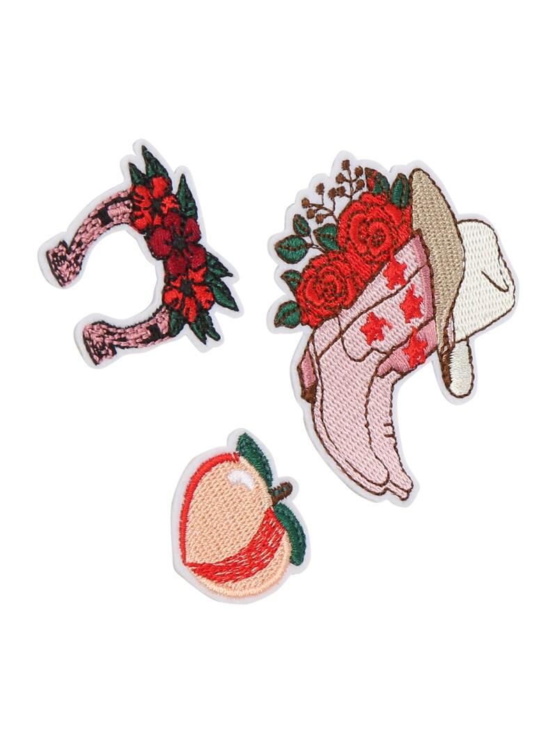 sinned x about you Broche 'Melissa' Daahls by Emma Roberts exclusively for ABOUT YOU en Mezcla De Colores
