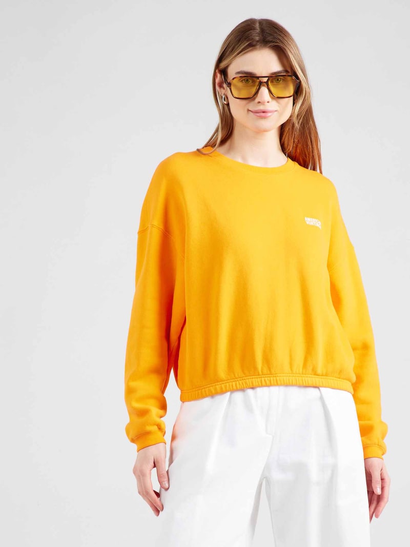 Sinned X About You Sudadera 'IZUBIRD' AMERICAN VINTAGE En Naranja