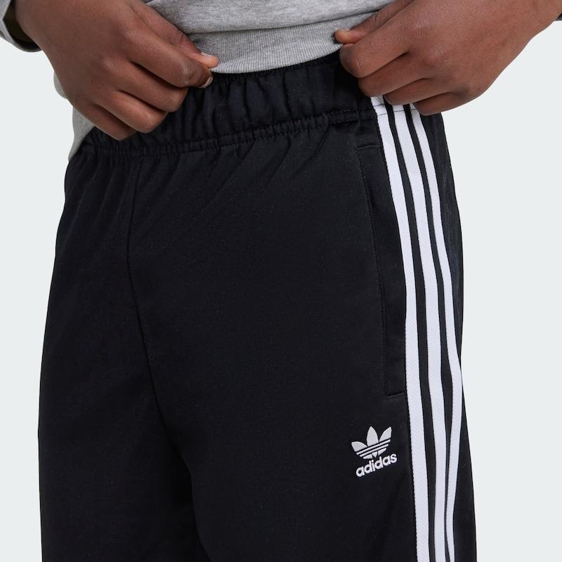 Sinned X About You Tapered Pantalón 'Adicolor' ADIDAS ORIGINALS En Negro