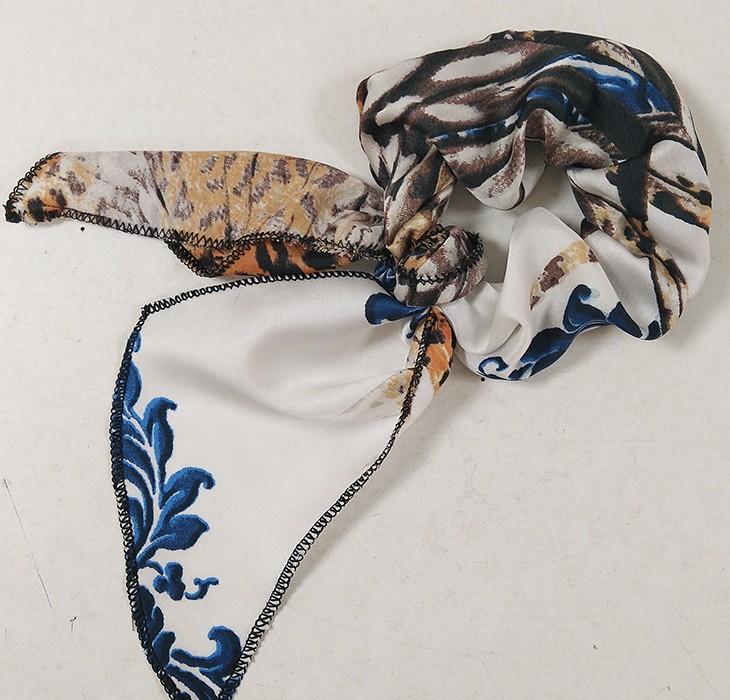 susana escribano Coletero con estampado animal. Tejido de raso