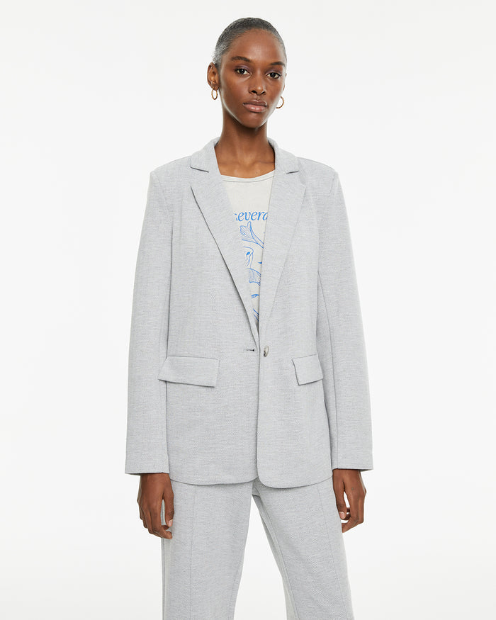 system action Americana cuello solapa de manga larga con hombreras