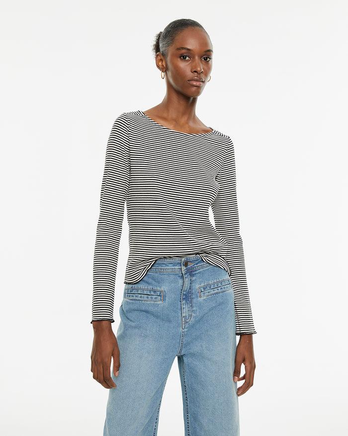 system action Camiseta de rayas bicolor detalle baby overlock