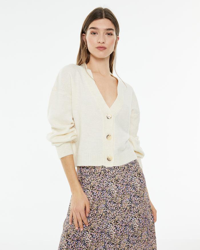 system action Cárdigan crop de manga corta con cierre botones