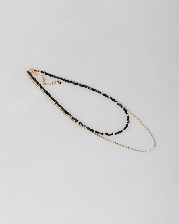 System Action Collar Doble Abalorios Negros Y Cadena Color Oro