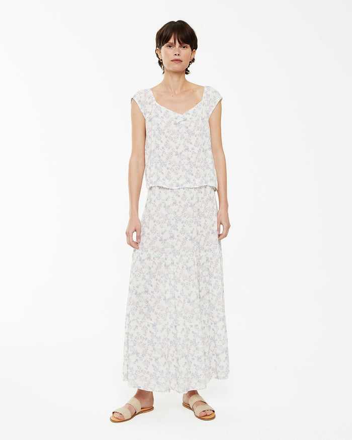 system action Falda midi con estampado de flores y volantes