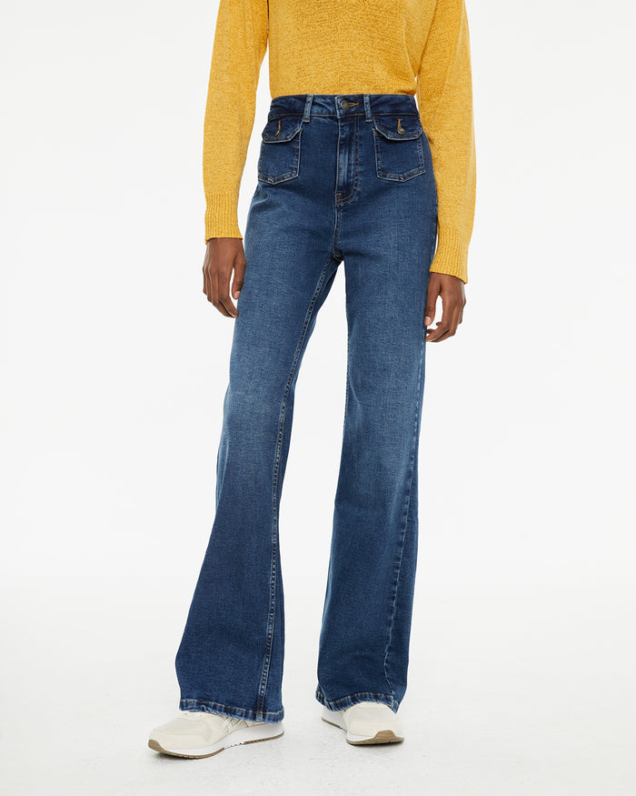 System Action Jeans Fit Flare Tiro Medio Detalle Bolsillos Delanteros