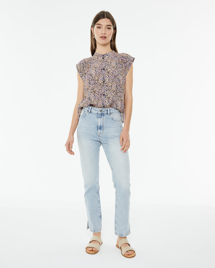 system action Jeans rectos de tiro medio efecto desgastado