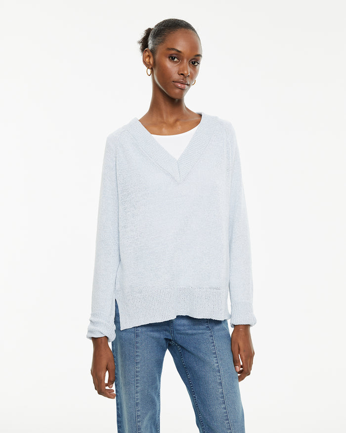 system action Jersey escote pico con aberturas laterales y acabados rib