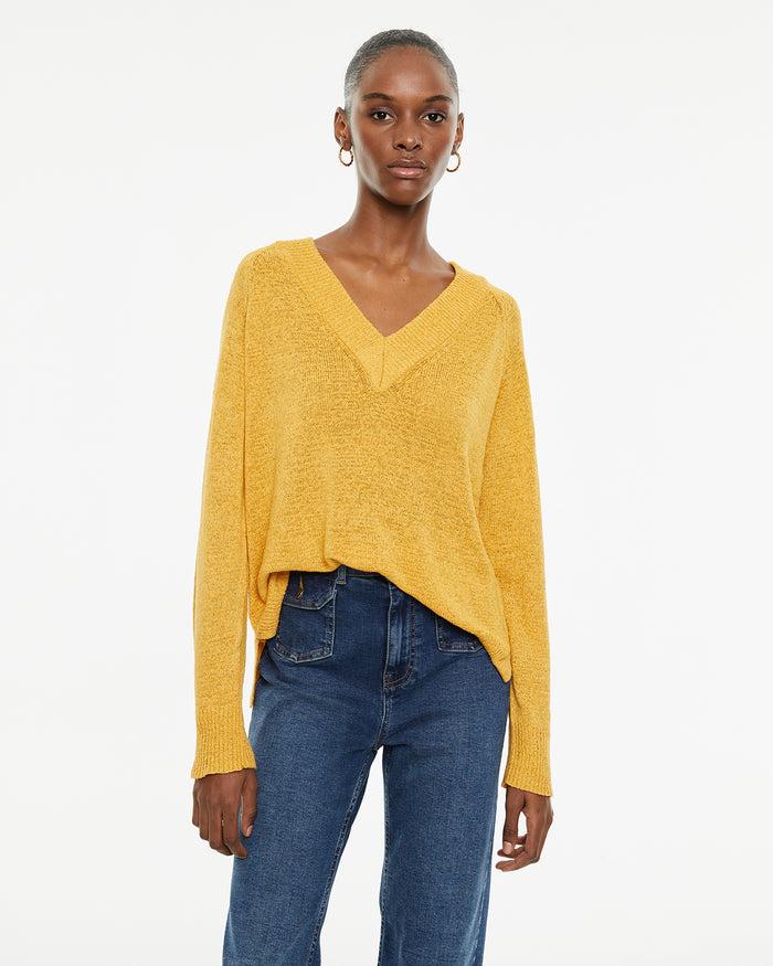 system action Jersey escote pico con aberturas laterales y acabados rib