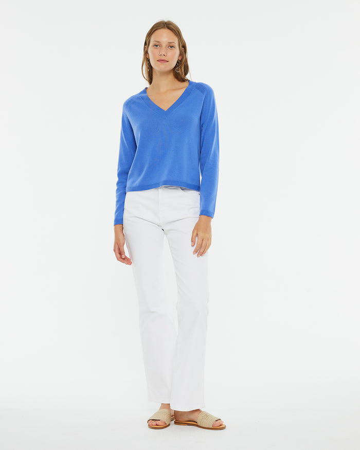 system action Pantalón denim fit flare blanco de tiro medio