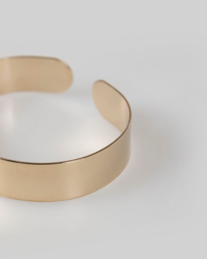 System Action Brazalete Rígido Oro