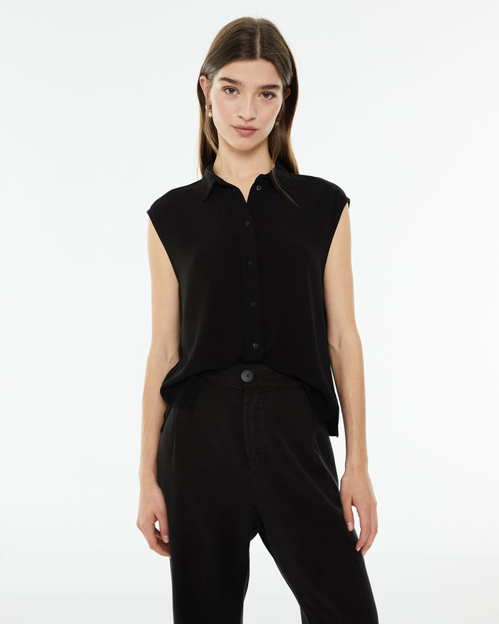 system action Camisa fluida oversize sin mangas